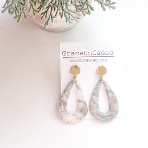Resin and brass teardrop